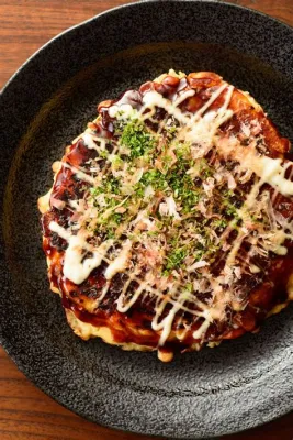  Okonomiyaki: Một bữa tiệc Umami bùng nổ với sự hài hòa của ngọt và mặn!